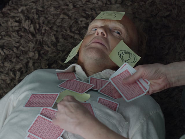 Actor Toby Jones in a video still from Ed Atkins' work Nurses Come and Go, But None For Me, 2024