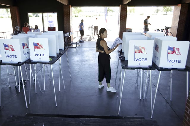 File photo: a voter at the Vilas Park Shelter in Madison, Wisconsin, in 2022.