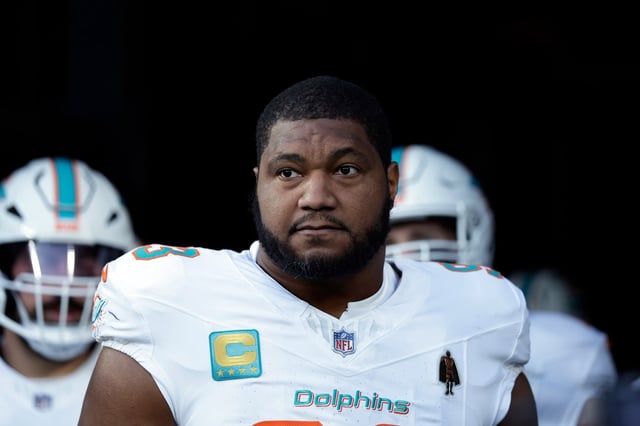 Miami Dolphins defensive tackle Calais Campbell (93) waits to take the field during an NFL football game against the New York Jets Sunday, Jan. 5, 2025, in East Rutherford, N.J. (AP Photo/Adam Hunger)