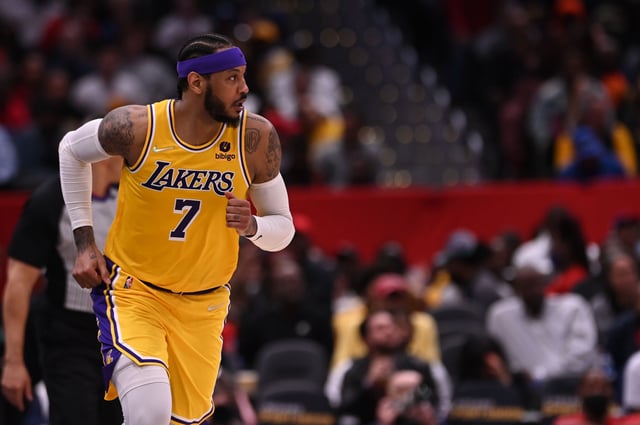 Mar 19, 2022; Washington, District of Columbia, USA; Los Angeles Lakers forward Carmelo Anthony (7) runs down the court after making a basket  during the second half against the Washington Wizards at Capital One Arena. Mandatory Credit: Tommy Gilligan-USA TODAY Sports/File Photo