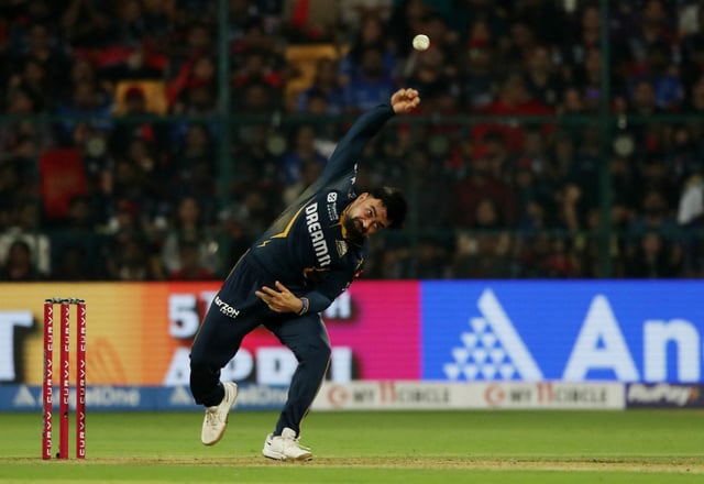 Cricket - Indian Premier League - Royal Challengers Bengaluru v Gujarat Titans - M Chinnaswamy Stadium, Bengaluru, India - April 2, 2025 Gujarat Titans' Rashid Khan in action REUTERS/Stringer