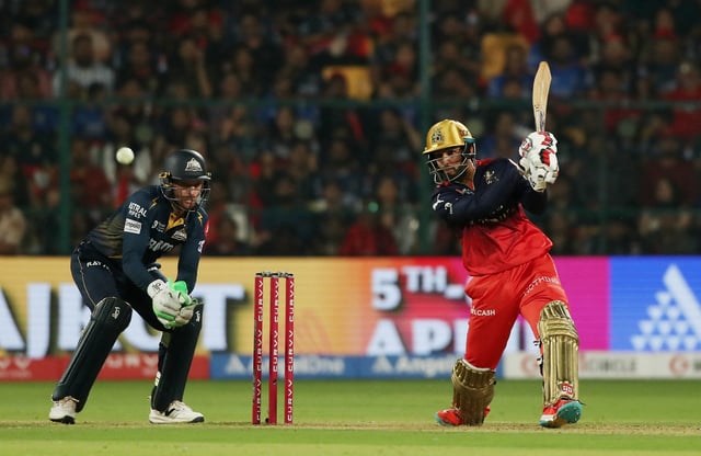 Cricket - Indian Premier League - Royal Challengers Bengaluru v Gujarat Titans - M Chinnaswamy Stadium, Bengaluru, India - April 2, 2025 Royal Challengers Bengaluru's Jitesh Sharma in action REUTERS/Stringer