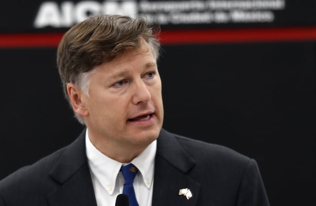 FILE - Then U.S. Ambassador to Mexico Christopher Landau delivers a statement to members of the media at the Benito Juarez International Airport, upon his arrival to Mexico City, Aug. 16, 2019. (AP Photo/Eduardo Verdugo, File)