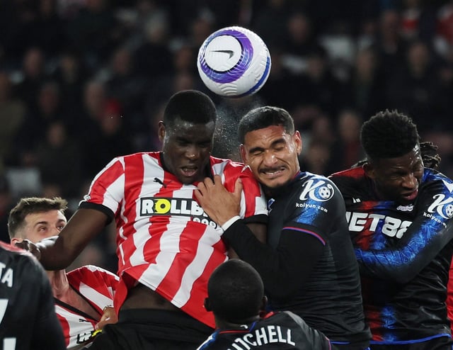 Soccer Football - Premier League - Southampton v Crystal Palace - St Mary's Stadium, Southampton, Britain - April 2, 2025 Southampton's Paul Onuachu in action with Crystal Palace's Maxence Lacroix