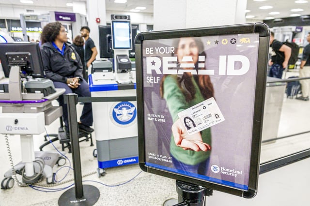 A Homeland Security REAL ID message in  Miami International Airport in 2024.