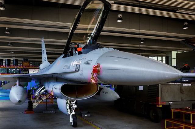 An F-16 fighter jet is seen at a maintenance hangar in Volkel, Netherlands June 9, 2023. REUTERS/Piroschka van de Wouw/File photo
