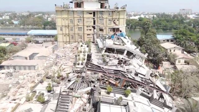 An aerial view shows flattened buildings and one damaged following an earthquake on March 28, in a location given as Mandalay region, Myanmar, in this screen grab obtained from a social media video released March 31, 2025. Myanmar Fire Services Department via Facebook/via REUTERS  THIS IMAGE HAS BEEN SUPPLIED BY A THIRD PARTY. MANDATORY CREDIT. NO RESALES. NO ARCHIVES.