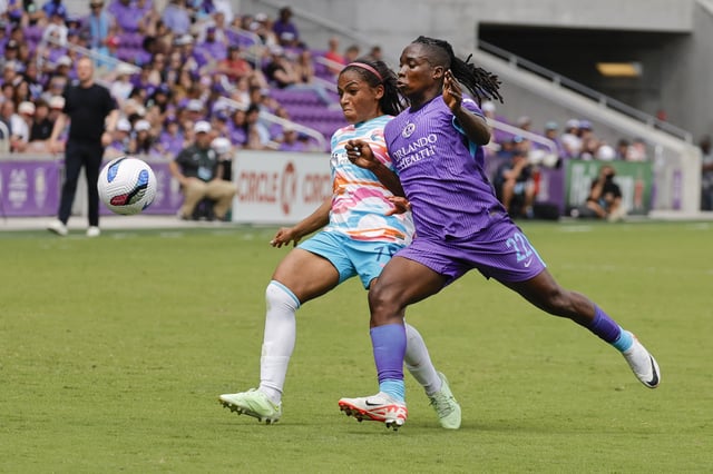 Mar 29, 2025; Orlando, Florida, USA; Orlando Pride forward Barbra Banda (22) battles San Diego Wave FC midfielder Perle Morroni (75) for the ball during the second half at Inter&Co Stadium. Mandatory Credit: Reinhold Matay-Imagn Images/File Photo