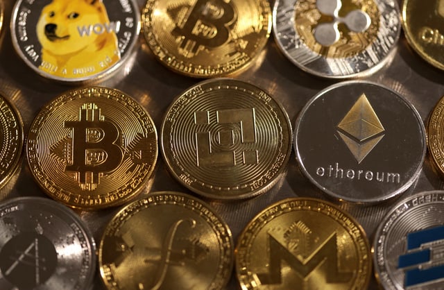 Representations of cryptocurrencies are seen in this illustration, August 10, 2022. REUTERS/Dado Ruvic/Illustration
