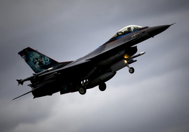 An F-16 fighter jet arrives at Volkel Air Base after a farewell tour in Volkel, the Netherlands, on September 27, 2024, as the Royal Netherlands Air Force retires their F-16 jets.