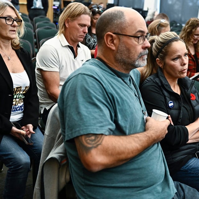 Freedom Convoy organizers Chris Barber and Tamara Lich sit in the gallery as they wait for the start of the day's hearings at the Public Order Emergency Commission, where they were to appear as witnesses, in Ottawa on Wednesday, Nov. 2, 2022. THE CANADIAN PRESS/Justin Tang