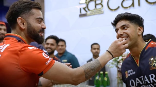 Virat Kohli (L) and Swastik Chikara