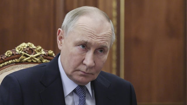Russian President Vladimir Putin meets with Head of the Republic of Buryatia Alexei Tsydenov at the Kremlin in Moscow, Russia, Wednesday, April 2, 2025.