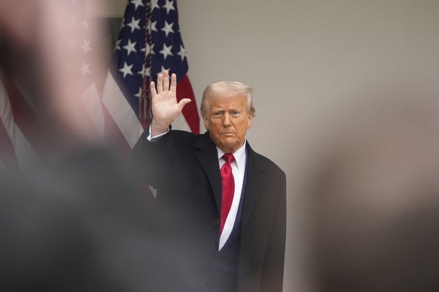 President Donald Trump waves after an event to announce new tariffs in the Rose Garden at the White House, Wednesday, April 2, 2025, in Washington. (AP Photo/Mark Schiefelbein)