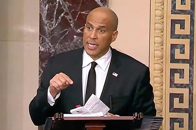 In this image provided by Senate Television, Sen. Cory Booker, D-N.J. speaks on the Senate floor, Tuesday morning, April 1, 2025. (Senate Television via AP)
