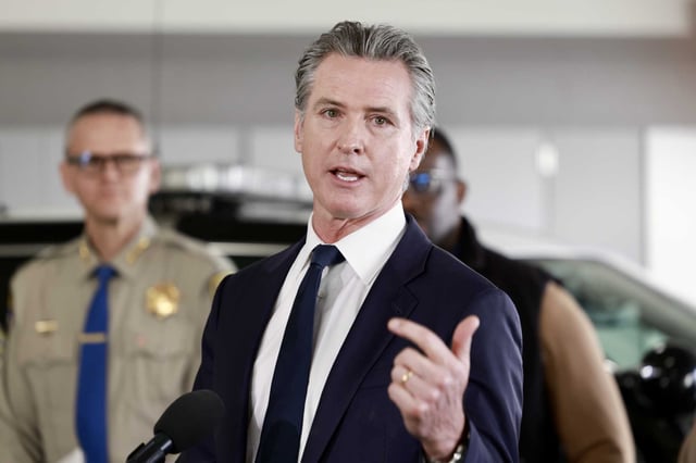 California Gov. Gavin Newsom makes an announcement alongside California Highway Patrol regarding public safety during a press conference in Oakland, December 27, 2024. A year after its launch, the surge operation has resulted in the recovery of 3,217 stolen vehicles and the arrest of 1,823 suspects, according to the governor’s office.