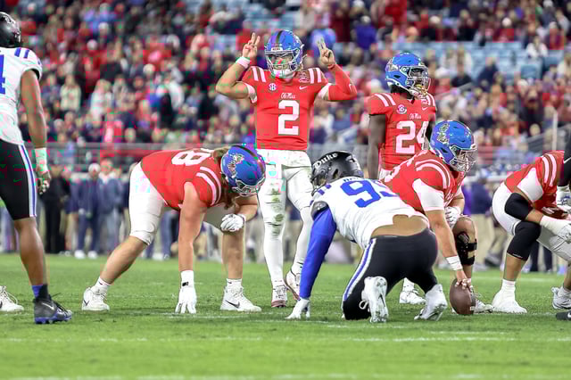 Jaxson Dart #2 of the Mississippi Rebels signals before the snap during the second half of the TaxSlayer Gator Bowl between Duke Blue Devils and Ole Miss Rebels at EverBank Stadium.