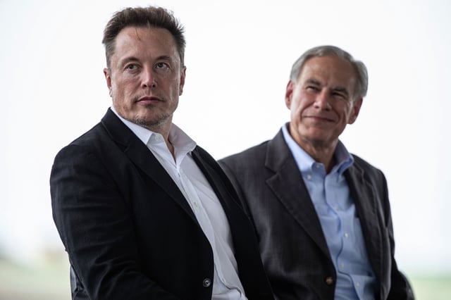Tesla CEO, Elon Musk, left, sits with Texas Gov. Greg Abbott at a groundbreaking ceremony for the auto manufacturer&#39;s lithium refining facility in Robstown, Texas, on Monday, May 8, 2023.