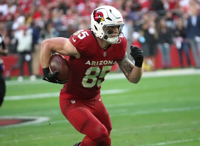 Tight end Trey McBride #85 of the Arizona Cardinals gains extra yards after the catch in the second half of the San Francisco 49ers versus the Arizona Cardinals NFL football game at State Farm Stadium on January 5, 2025.