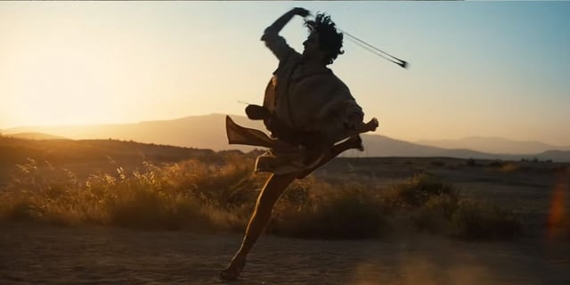 David (Michael Iskander) slings his stone on the battlefield on 'House of David'