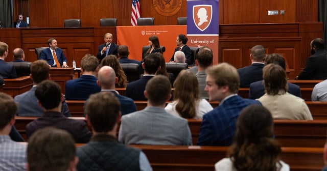 From left: University of Texas Interim President Jim Davis, Gov. Greg Abbott and Texas Law Federalist Society President Jordan Lamb participate in an event at The University of Texas Law School in Austin on April 3, 2025.