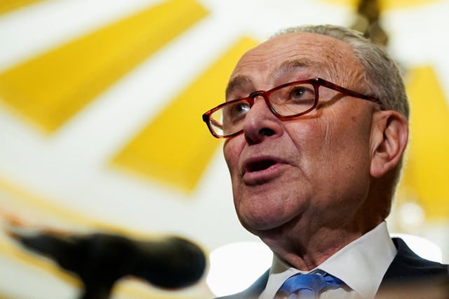 Senate Minority Leader Chuck Schumer (D-NY)  speaks to the media, on the day of Senate Democrats' weekly policy lunch on Capitol Hill in Washington, D.C., U.S., February 19, 2025. REUTERS/Kent Nishimura