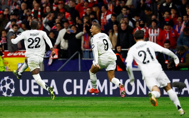 Soccer Football - Champions League - Round of 16 - Second Leg - Atletico Madrid v Real Madrid - Metropolitano, Madrid, Spain - March 12, 2025 Real Madrid's Kylian Mbappe and Antonio Rudiger celebrate after the match REUTERS/Susana Vera/File Photo