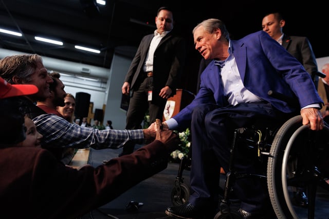 Gov. Greg Abbott greets supporters at San Antonio Christian School Feb. 17 after giving a speech to promote school vouchers.