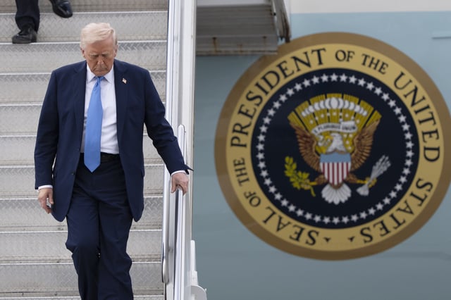 President Donald Trump arrives on Air Force One at Palm Beach International Airport, Friday, March 28, 2025, in West Palm Beach, Fla. (AP Photo/Manuel Balce Ceneta)