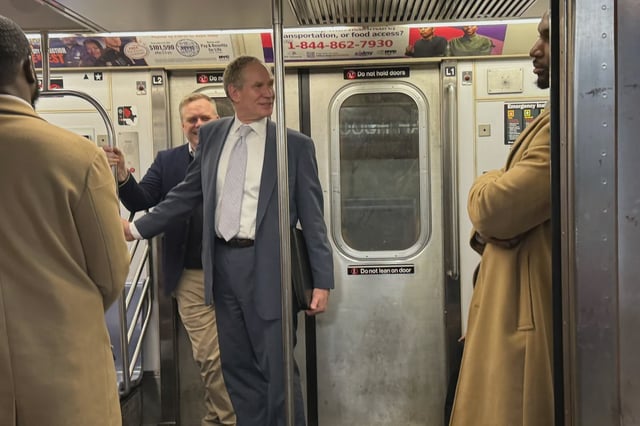 MTA Chair Janno Lieber boards a train after looking in vain for Mayor Adams and transportation secretary Sean Duffy.