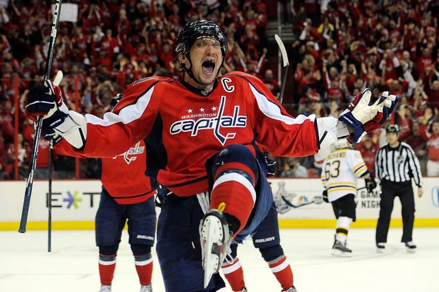 Alex Ovechkin #8 of the Washington Capitals celebrates after scoring a goal in the third period against the Boston Bruins in Game Six of the Eastern Conference Quarterfinals during the 2012 NHL Stanley Cup Playoffs at Verizon Center on April 22, 2012 in Washington, DC.
