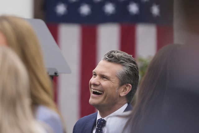 Defense Secretary Pete Hegseth arrives before President Donald Trump speaks during an event to announce new tariffs in the Rose Garden at the White House, Wednesday, April 2, 2025, in Washington. (AP Photo/Mark Schiefelbein)
