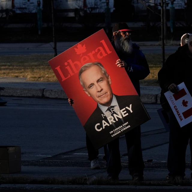 Supporters of Liberal Leader Mark Carney wait outside of an event on Thursday, April 3, 2025 in Montreal. THE CANADIAN PRESS/Adrian Wyld