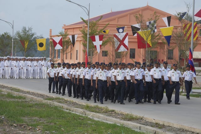Cambodian navy officers walk for attending an official inauguration of the Ream Naval Base in Sihanoukville, southwestern of Phnom Penh, Cambodia, Saturday, April 5, 2025. (AP Photo/Heng Sinith)