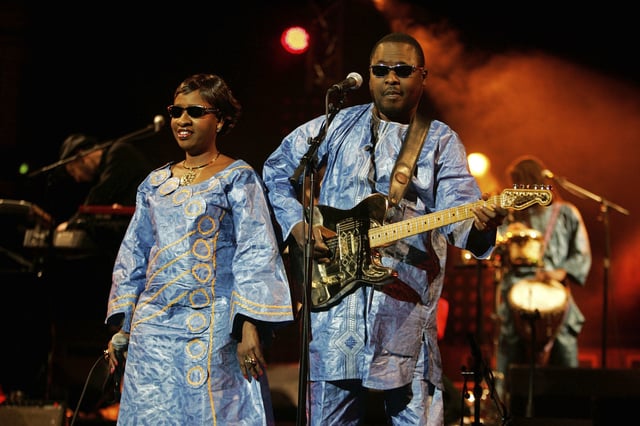 FILE - Blind duo from Mali, Amadou Bagayoko, right, and Mariam Doumbia, seen, during a concert in Paris, Monday, Dec. 1, 2008. (AP Photo/Michel Euler, file)