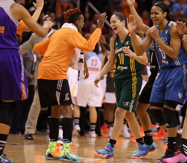 Western Conference All-Stars Sue Bird #10 of the Seattle Storm, Maya Moore #23 of the Minnesota Lynx and Brittney Griner #42 of the Phoenix Mercury celebrate during the WNBA All-Star Game at US Airways Center on July 19, 2014 in Phoenix, Arizona.