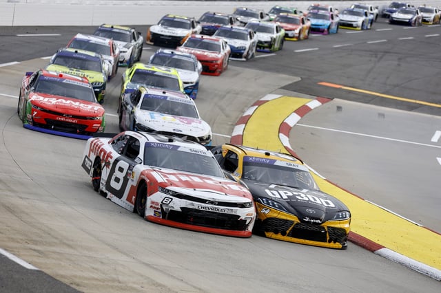 Sammy Smith, driver of the #8 Pilot Chevrolet, and Taylor Gray, driver of the #54 Operation 300 Toyota, during the NASCAR Xfinity Series US Marine Corps 250 at Martinsville Speedway on March 29, 2025 in Martinsville, Virginia.
