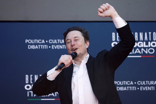 Tesla and SpaceX's CEO Elon Musk gestures, as he attends political festival Atreju organised by Italian Prime Minister Giorgia Meloni's Brothers of Italy (Fratelli d'Italia) right-wing party, in Rome, Italy, December 16, 2023. REUTERS/Guglielmo Mangiapane/File Photo