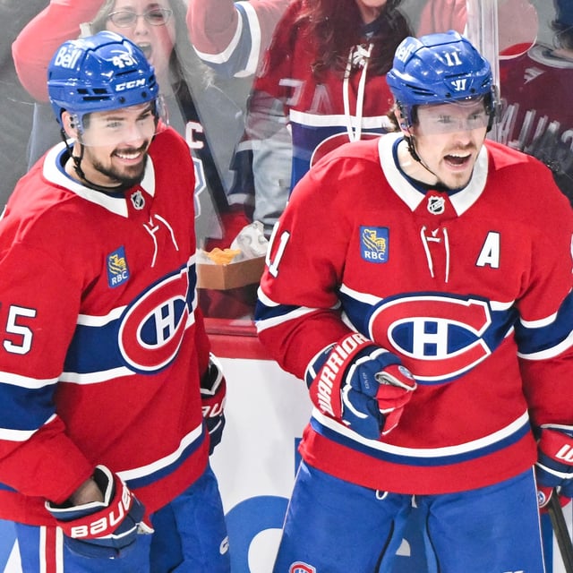 Montreal Canadiens' Brendan Gallagher (11) celebrates with teammate Alexandre Carrier (45) after scoring against the Philadelphia Flyers during third period NHL hockey action in Montreal, Saturday, April 5, 2025. THE CANADIAN PRESS/Graham Hughes