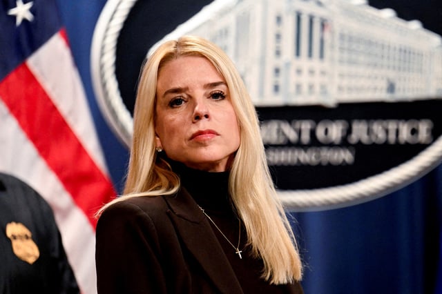 U.S. Attorney General Pam Bondi looks on during her first press conference at the Justice Department in Washington, D.C., U.S., February 12, 2025. REUTERS/Craig Hudson/File Photo