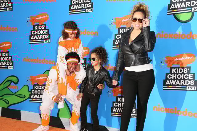 Mariah Carey, Nick Cannon and their kids Monroe Cannon and Moroccan Scott Cannon attend the Nickelodeon Kids' Choice Awards on March 24, 2018.