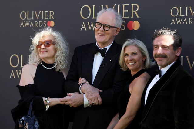 John Lithgow and Mary Yeager attend the Olivier Awards at the Royal Albert Hall in London, Britain, April 6, 2025. REUTERS/Isabel Infantes