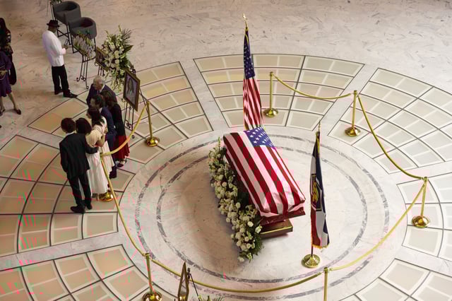 Attendees pay their respects during a funeral service for former U.S. Rep. Mia Love, Sunday, April 6, 2025, in Salt Lake City. (AP Photo/Melissa Majchrzak)