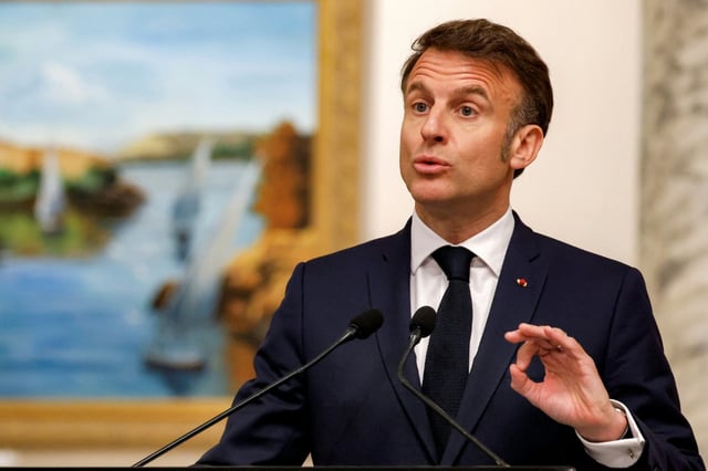 French President Emmanuel Macron speaks during a press conference in Cairo