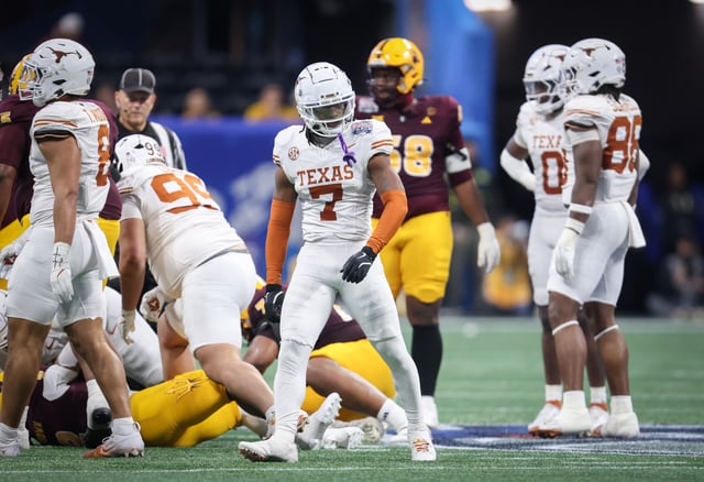 Jahdae Barron #7 of the Texas Longhorns celebrates after a play against the Arizona State Sun Devils during the second half against at Mercedes-Benz Stadium on January 1, 2025 in Atlanta, Georgia.