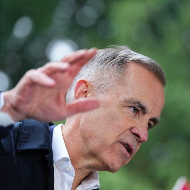 Liberal Leader Mark Carney takes questions from the media on the campaign trail in Saanichton, B.C., on April 7, 2025.