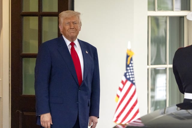 President Donald Trump watches as Israel's Prime Minister Benjamin Netanyahu leaves the West Wing of the White House, Monday, April 7, 2025, in Washington. (AP Photo/Mark Schiefelbein)