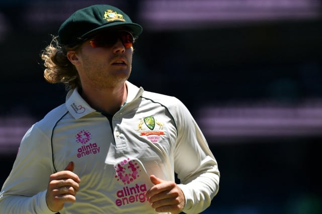 Australia's Will Pucovski fields during the fifth day of the third cricket Test match between Australia and India at the Sydney Cricket Ground (SCG) in Sydney on January 11, 2021.