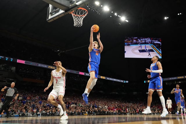 Apr 7, 2025; San Antonio, TX, USA; Florida Gators guard Walter Clayton Jr. (1) dunks against the Houston Cougars during the second half of the national championship game of the Final Four of the 2025 NCAA Tournament at the Alamodome. Mandatory Credit: Bob Donnan-Imagn Images