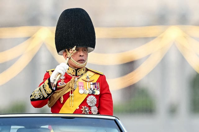 Thailand's King Maha Vajiralongkorn inspects a guard of honour during the "Trooping the Colour" parade by the Thai Royal Guards and oath-giving ceremony to mark his 72nd birthday celebrations at the Dusit Palace in Bangkok on December 3, 2024. The ceremony is the first "Trooping the Colour" and associated oath-giving in 16 years and the first of such ceremonies to be held during the reign of Thailand's King Maha Vajiralongkorn. (Photo by Manan VATSYAYANA / AFP) (Photo by MANAN VATSYAYANA/AFP via Getty Images)